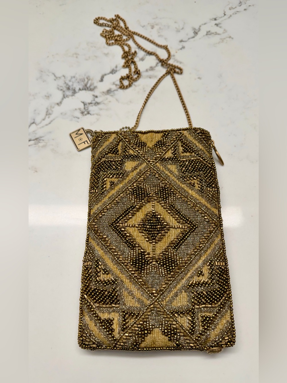 Vintage 1980s gold evening bag by Mary Frances